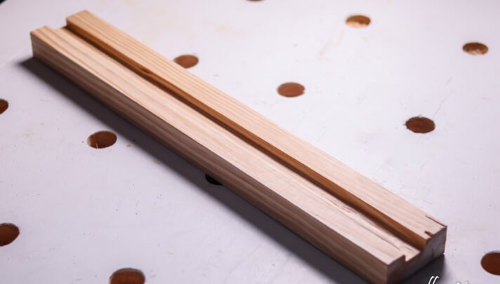 Wood with length-wise groove cut in it