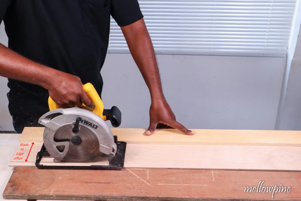Cutting the excess plywood to make the straight edge