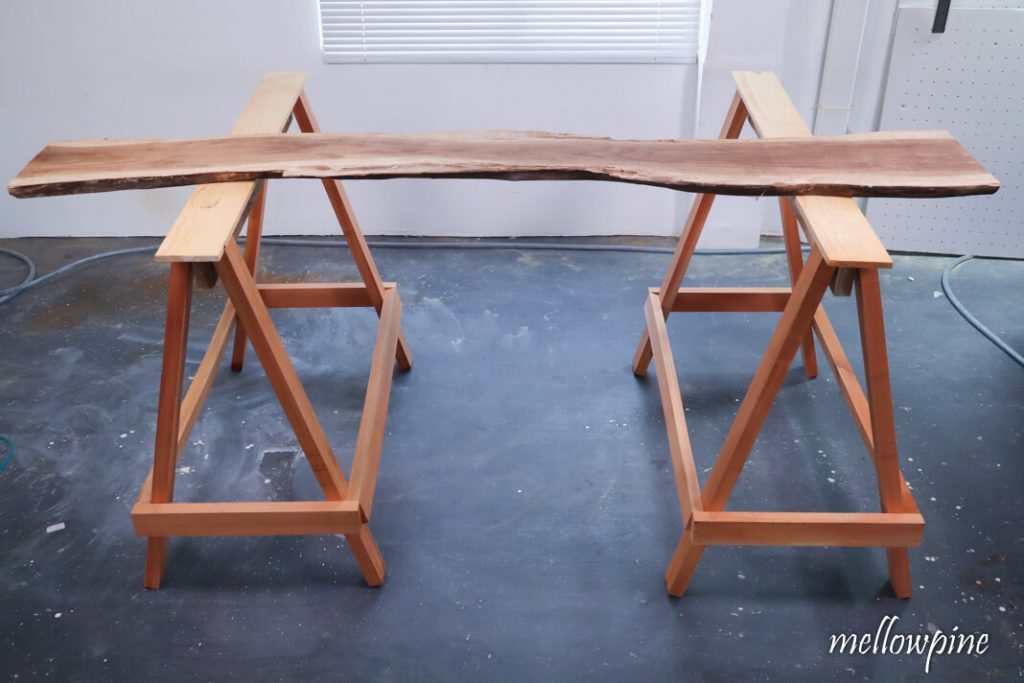 Placing the timber on the sawhorse