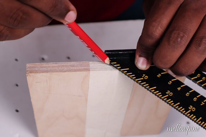 marking the line of cut on the plywood