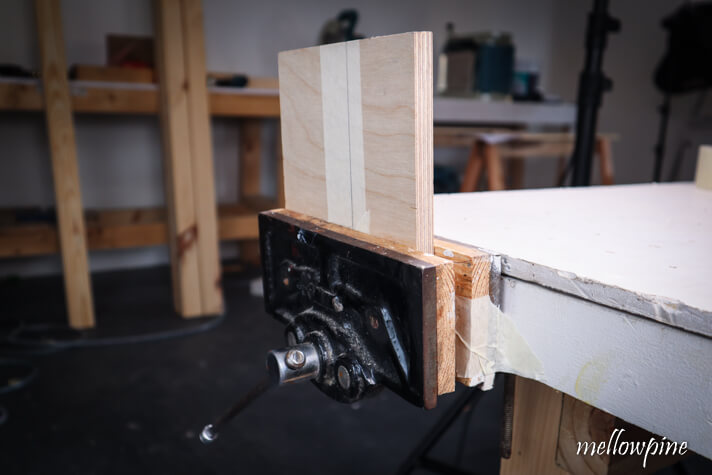 fixing the material on a bench wise