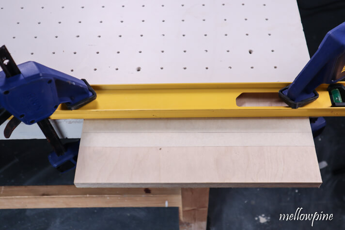 clamping a level on to the work table