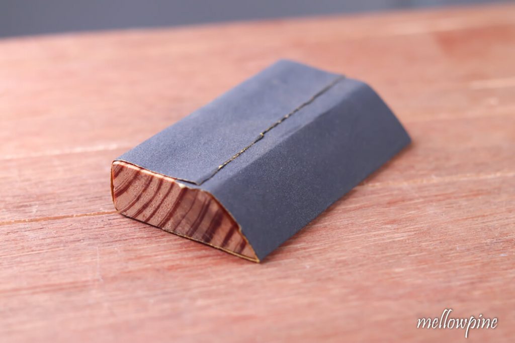 Glue sand paper on wood