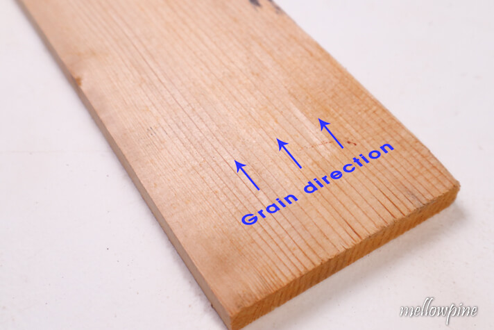 grain direction in the wood to be sanded