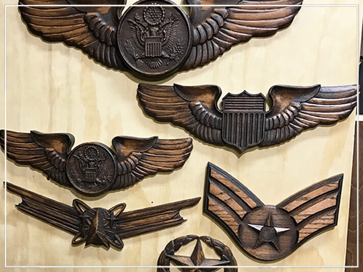 Badges made on Axiom CNC machine by Michael Branson