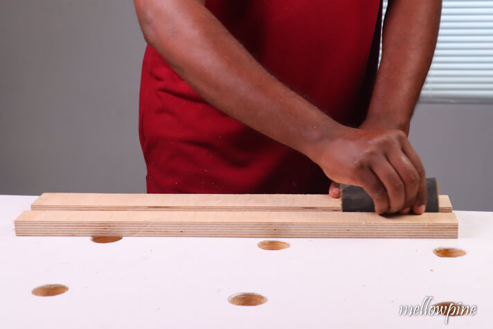sanding the groove to finish it