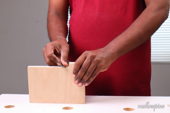 rounding the corners of the push block using sandpaper