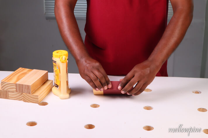 wrapping sandpaper over the block
