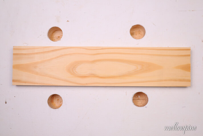 piece of scrap wood for supporting the wood to be bevel cut