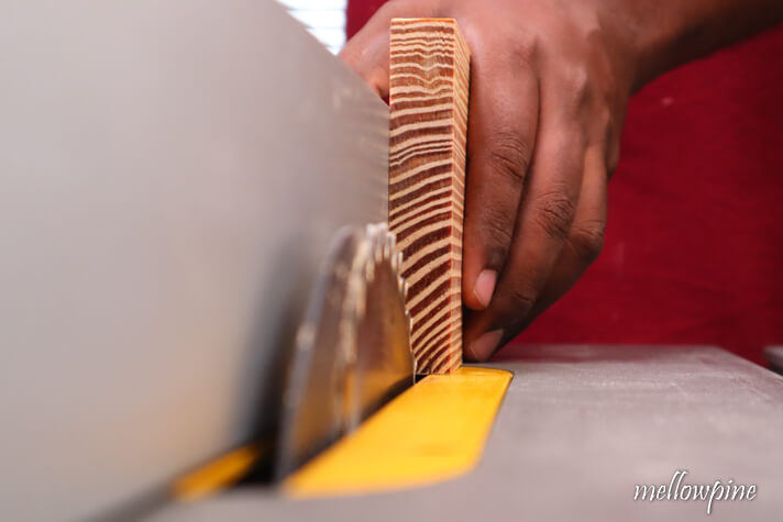 wood to be grooved placed on table saw along fence