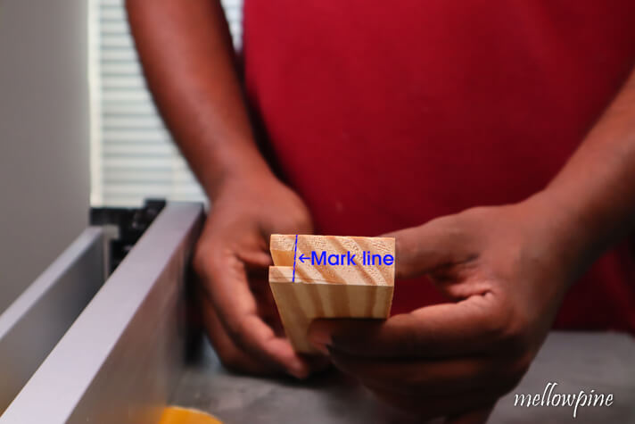 marking the cut line to make the tongue part of the rail