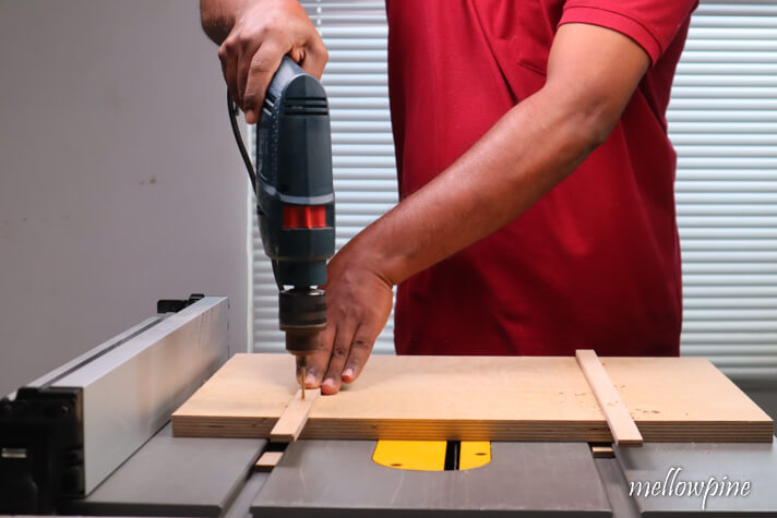 screwing the runners to the base of the miter sled