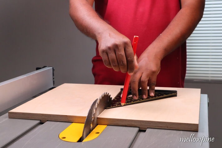 45° line towards the blade on the base