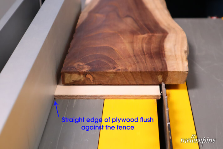 plywood placed flush against the rip fence