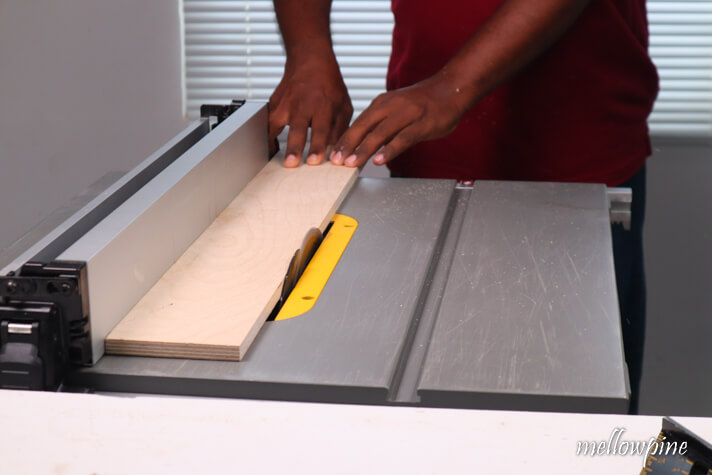sizing the plywood on table saw