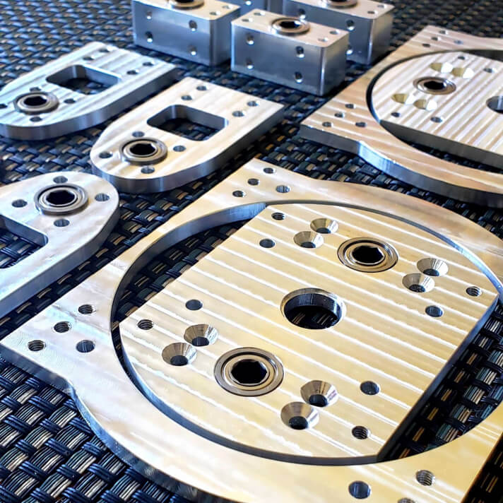 Aluminum parts made on Bantam Tools desktop mill