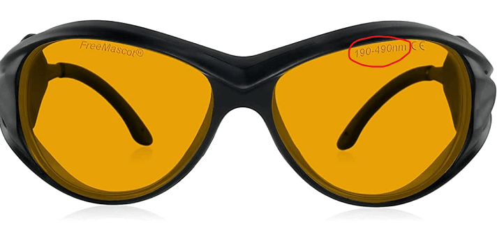 Laser glass marked with its wavelength range