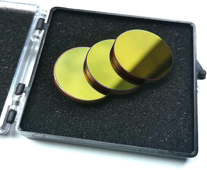 A highly reflective copper mirror used in laser cutters and engravers