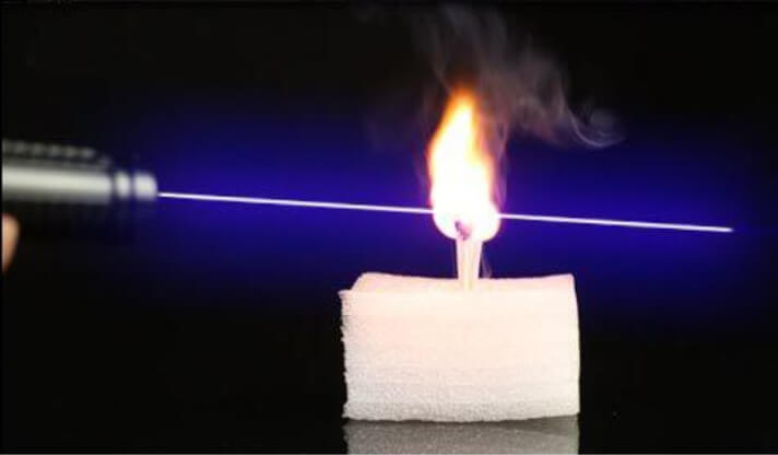 How does a laser burn material