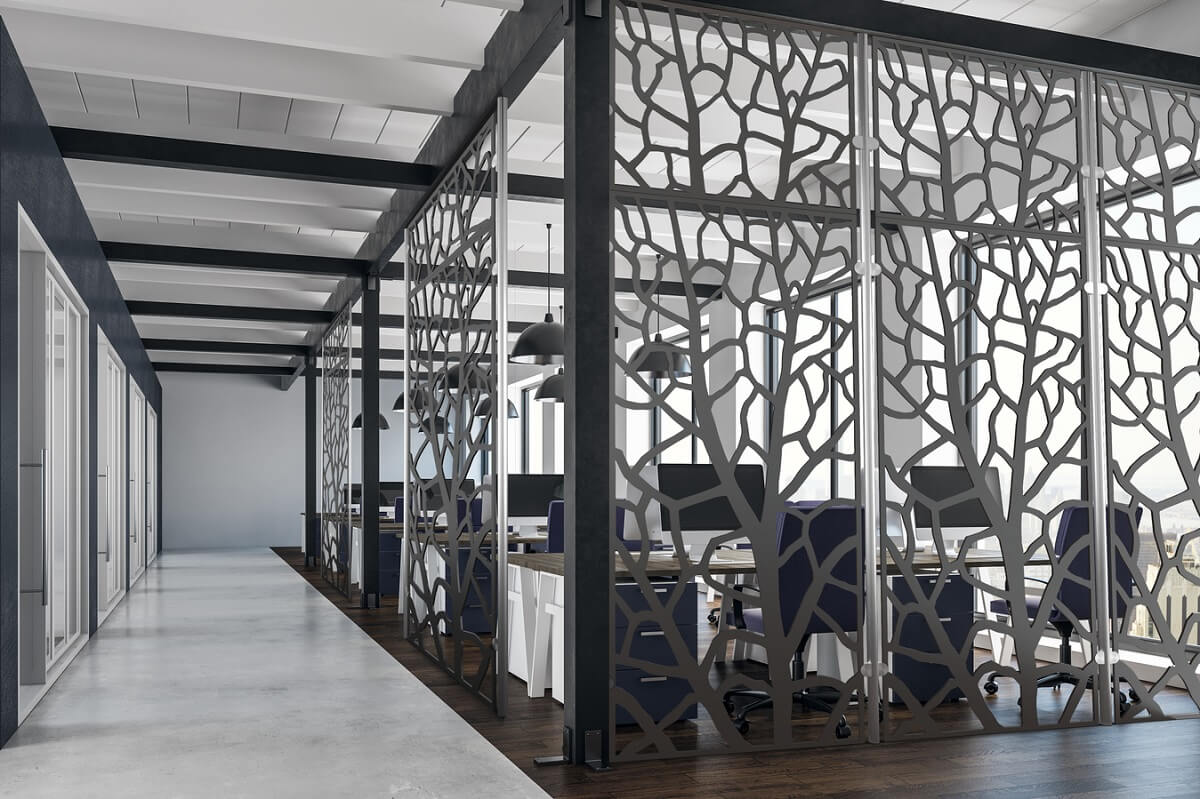 Laser-cut metal sheet used in workspace