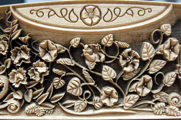Laser engraved intricate design on wood