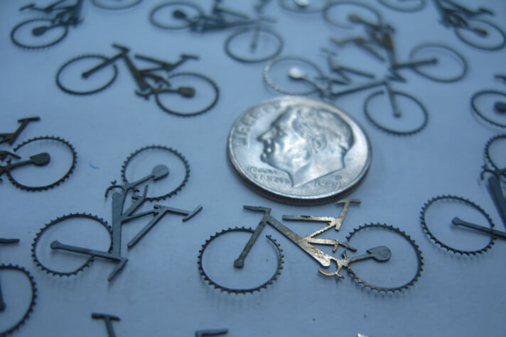 Laser cut miniature metal bicycle (Source Kernlasers)