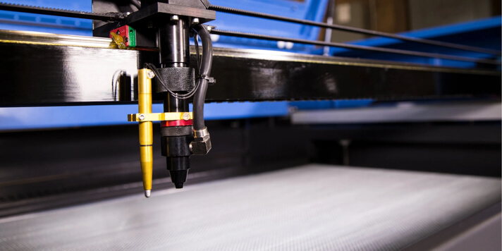Laser head with air assit nozzle (Source fslaser)