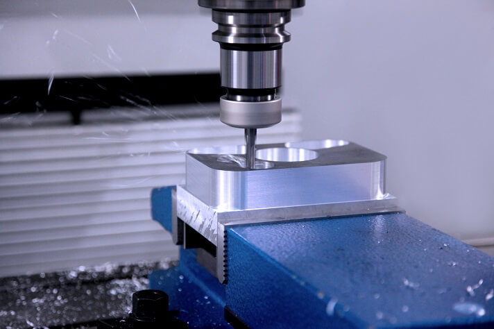 Milling operation on a metal workpiece.