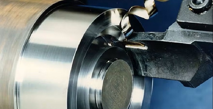 Performing internal grooving operation on a CNC lathe
