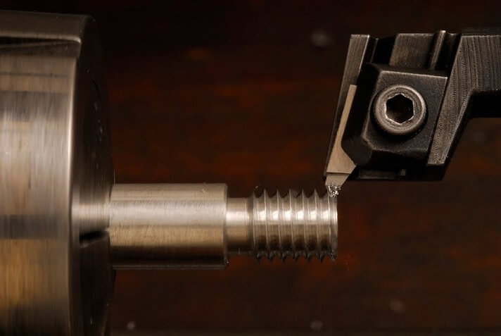 Performing threading operation on CNC lathe