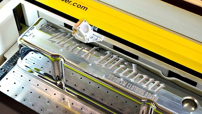 Fiber Laser engraving an engine head (Source Epilog Lasers)