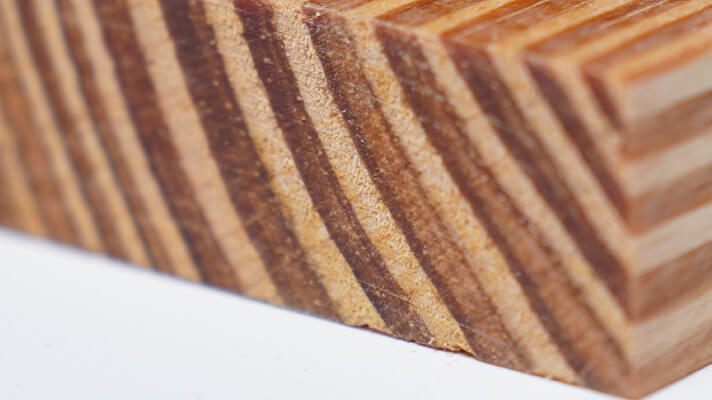 Rough end grain surface with a curved pattern