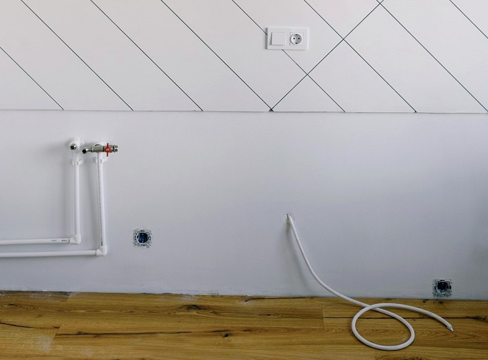 Pipes and electrical wires set up for a heating system