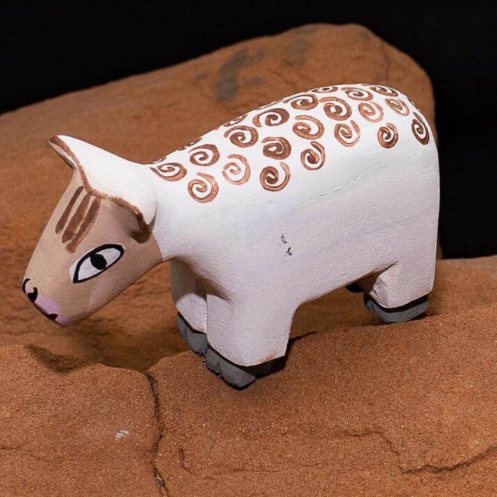 Sheep carved on aspen wood