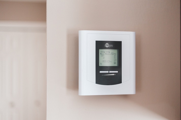 A thermostat installed on the wall