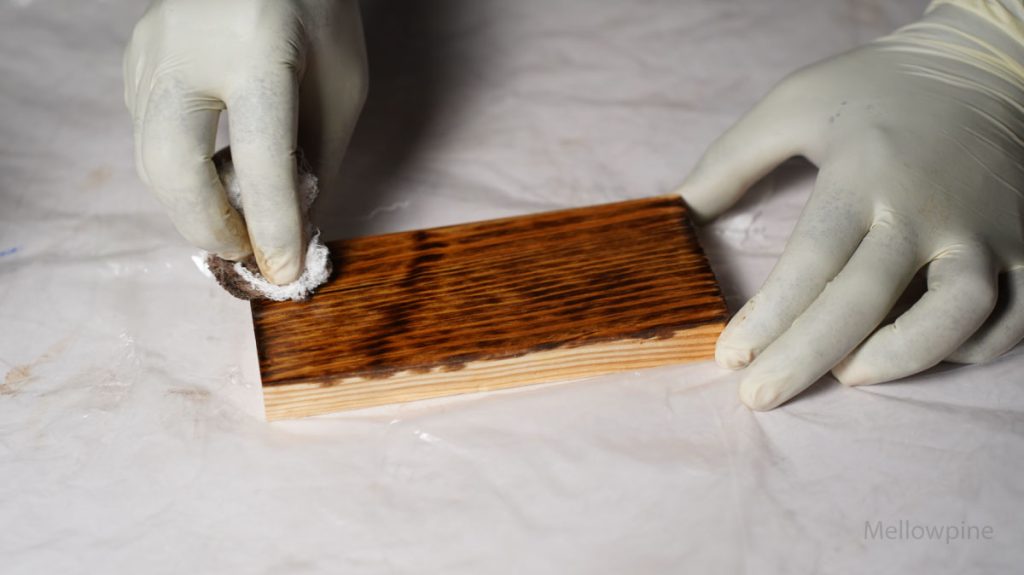 Wiping off excess danish oil from pine wood surface