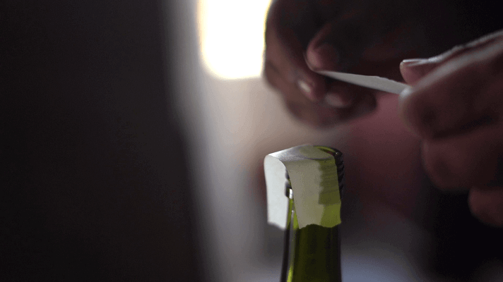 Covering the wine bottle opening