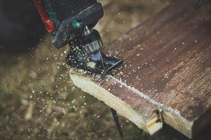 Scroll saw cutting wood