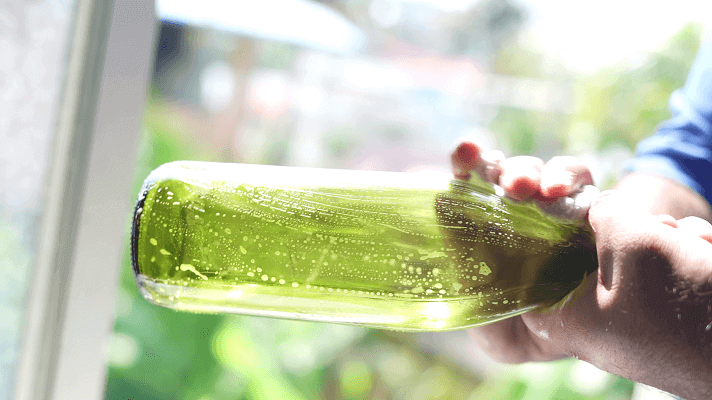 Washing wine glass surface for laser engraving