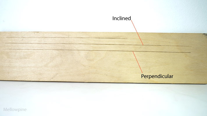 Plywood engraved perpendicular and inclined to the laser beam