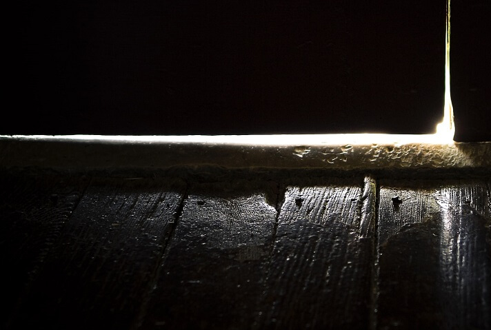 Protruding nails on an old wood flooring