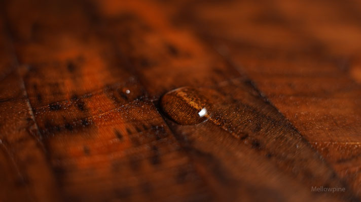 Water droplet stuck on a tung oil coated butcher block
