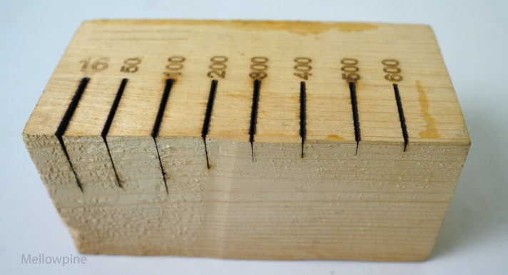 Test cuts on a 2.75" pine wood at varying speeds