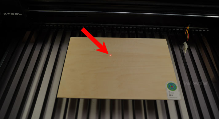 Using the red dot as a reference to align the laser