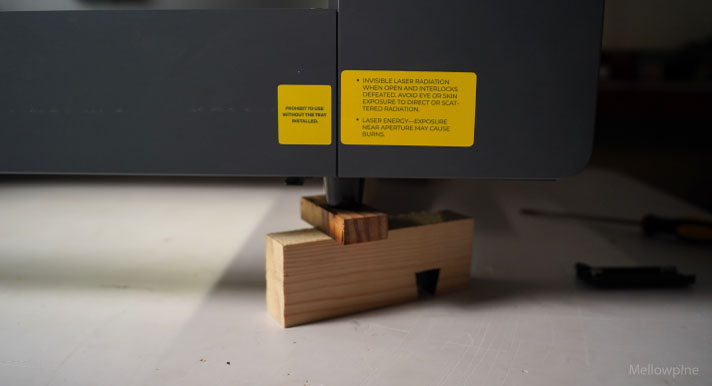 xTool P2 raised using some wooden blocks