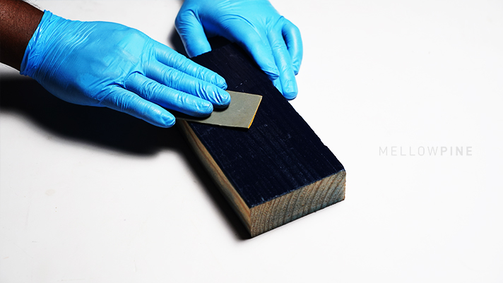Sanding the Painted Wood with 220 -Grit Sandpaper