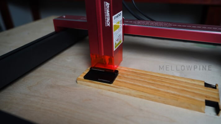 Using a focusing block to set laser focus