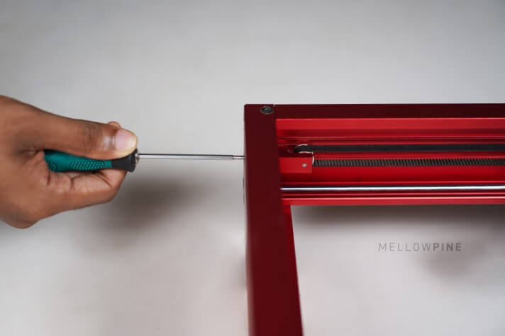 Adjusting belt tension
