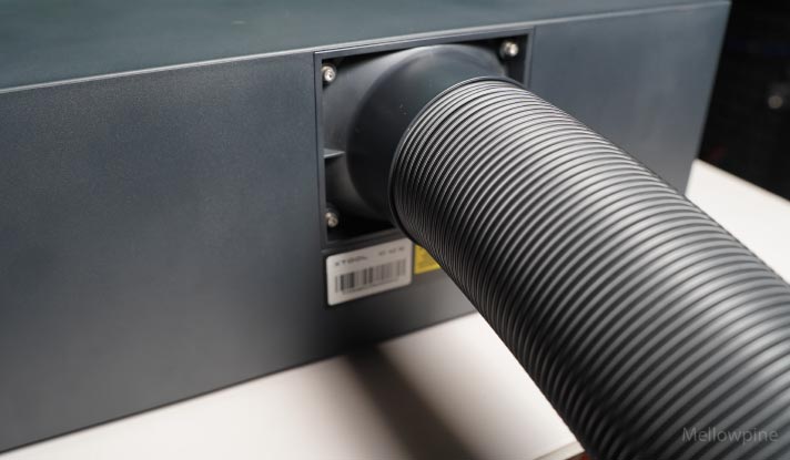 Exhaust tube connected to the port on the rear end of xTool S1