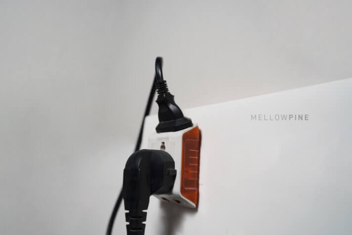Laser and air assist powered from a single outlet using a multi-plug extension